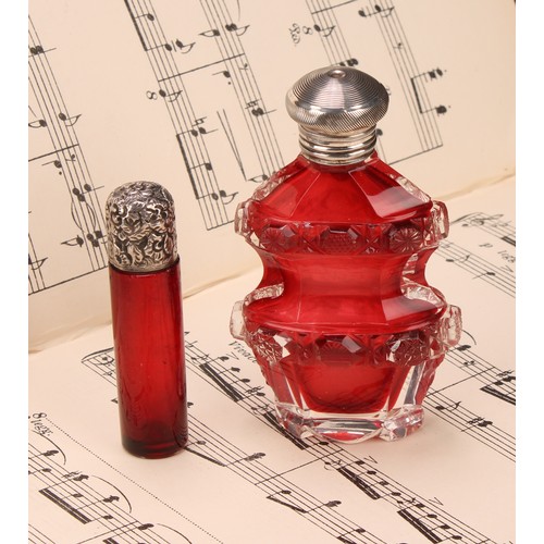 1255 - A 19th century silver coloured metal mounted cylindrical cranberry glass scent bottle, the hinged co... 