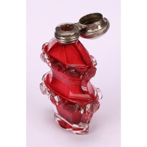 1255 - A 19th century silver coloured metal mounted cylindrical cranberry glass scent bottle, the hinged co... 