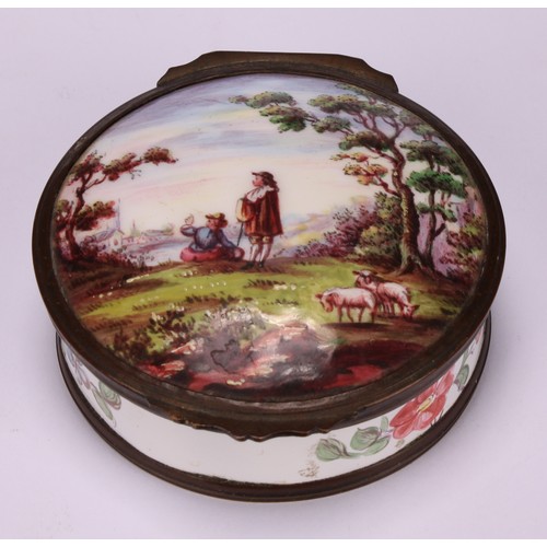 1249 - A 19th century enamel circular table snuff box, hinged cover painted with young shepherds in a pasto... 