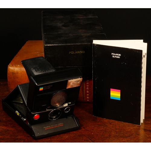 1238 - Photography - A Polaroid SLR 680 instant SLR camera, instruction manual, boxed