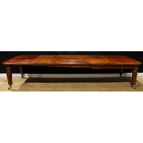 2169 - A William IV mahogany extending dining table, rounded rectangular top, four additional leaves, turne... 