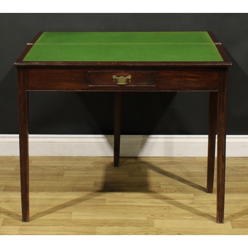 A George III mahogany card table, hinged top with moulded edge ...