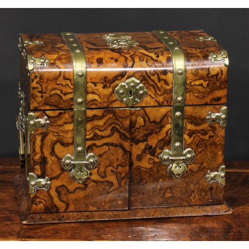 1940 - A Victorian brass mounted walnut rectangular liquor chest, the mounts cast in the Gothic manner, cur... 