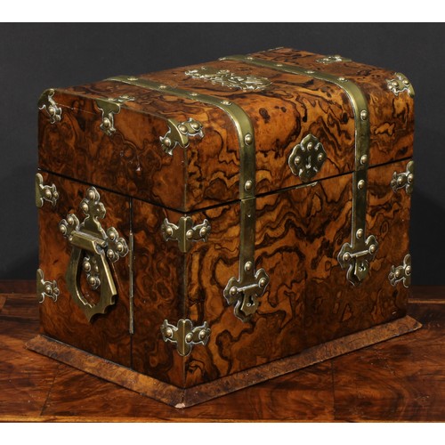 1940 - A Victorian brass mounted walnut rectangular liquor chest, the mounts cast in the Gothic manner, cur... 