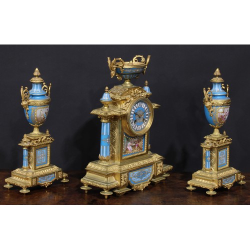 2251 - A 19th century French ormolu and porcelain clock garniature, in the Louis XVI Revival taste, 9cm dia... 