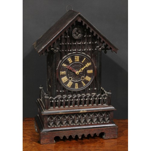 2252 - A Black Forest mantel cuckoo clock, 14cm dial applied with Roman numerals, twin winding holes, the a... 