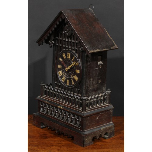 2252 - A Black Forest mantel cuckoo clock, 14cm dial applied with Roman numerals, twin winding holes, the a... 