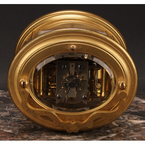 2261 - A late 19th century gilt brass oval repeating alarum carriage clock, 7cm enamel dial with Roman nume... 