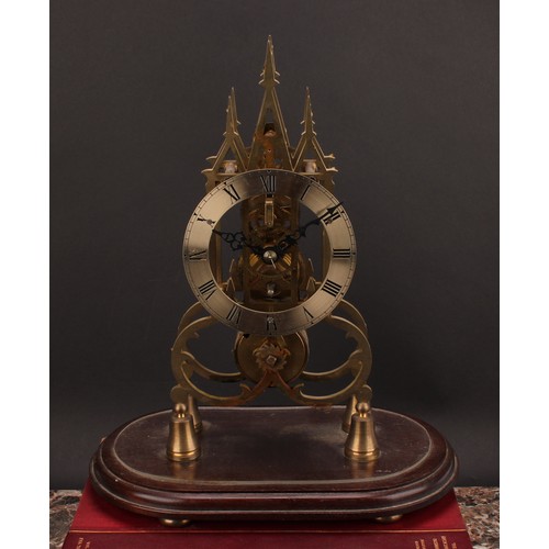 2263 - A 19th century style skeleton timepiece, in the Gothic taste, 13cm silvered clock dial inscribed wit... 