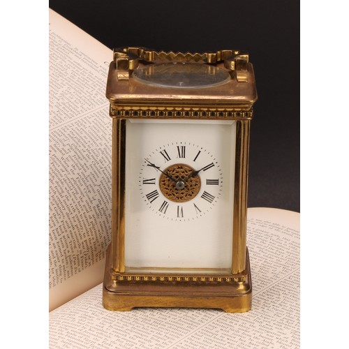 2264 - An early 20th century lacquered brass carriage clock, 6cm rectangular enamel dial inscribed with Rom... 