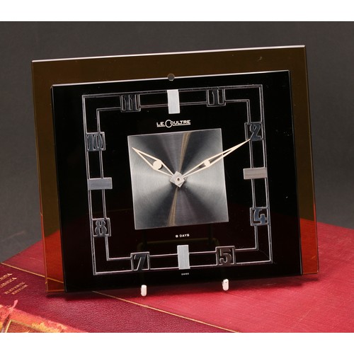 2266 - A Jaeger Le Coultre Art Deco clock, black glass rectangular dial applied with chrome Arabic numerals... 