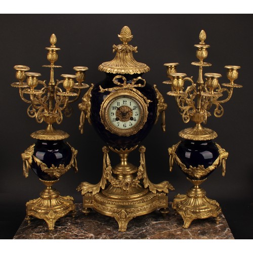 2267 - A late 19th century French gilt metal and porcelain clock garniture, 8cm circular dial inscribed wit... 