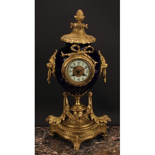 2267 - A late 19th century French gilt metal and porcelain clock garniture, 8cm circular dial inscribed wit... 