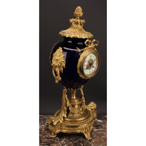 2267 - A late 19th century French gilt metal and porcelain clock garniture, 8cm circular dial inscribed wit... 