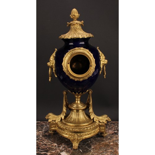 2267 - A late 19th century French gilt metal and porcelain clock garniture, 8cm circular dial inscribed wit... 