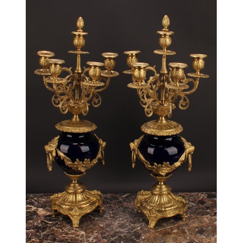 2267 - A late 19th century French gilt metal and porcelain clock garniture, 8cm circular dial inscribed wit... 