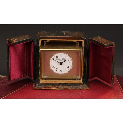 2270 - An early 20th century lacquered brass carriage timepiece, 4cm circular enamel dial inscribed S Smith... 