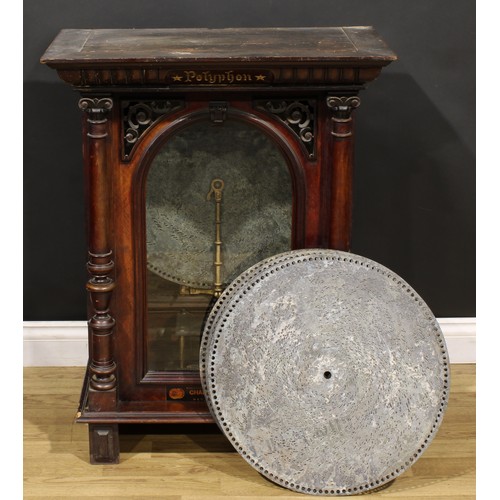 2236 - A 19th century coin operated penny-in-the-slot polyphon, the vertical movement playing 50cm discs, r... 