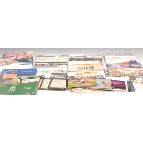 1201 - Stamps - a collection of modern GB QEII Presentation Packs, booklets on pages postage f/v approx £45... 