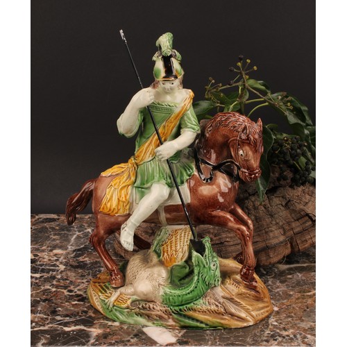 107 - A Staffordshire pearlware figure group, of George and the Dragon, George upon horse spearing the dra... 