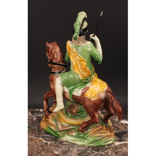 107 - A Staffordshire pearlware figure group, of George and the Dragon, George upon horse spearing the dra... 