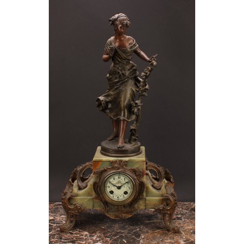 2470 - An early 20th century French spelter mounted onyx mantel clock, 7.5cm enamel dial inscribed with Ara... 