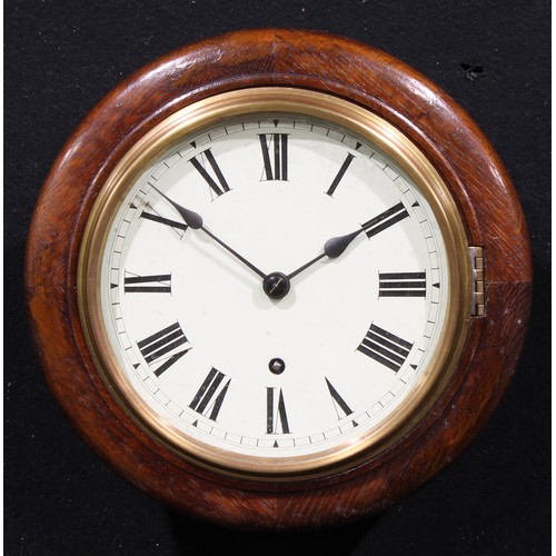 2495 - An early 20th century oak school or railway type timepiece, of small proportions, 18cm clock dial in... 