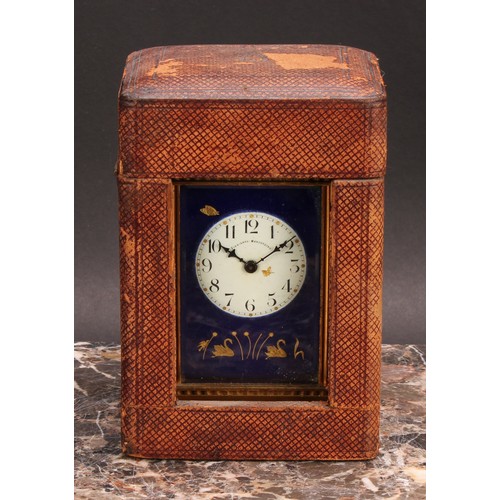 2472 - An early 20th century gilt brass carriage timepiece, 4.5cm enamel clock dial inscribed Finnigan’s, M... 