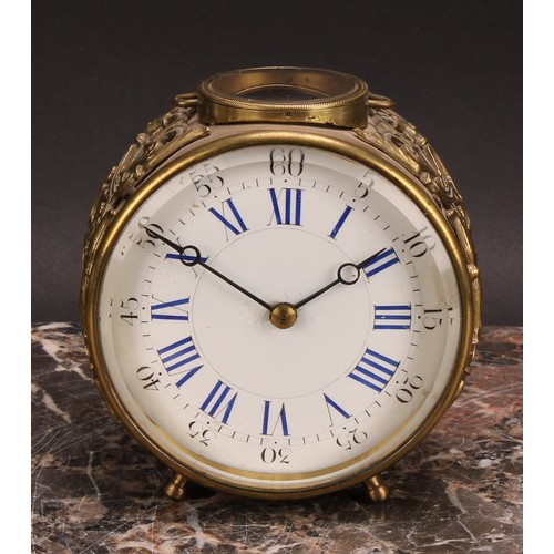 2463 - An early 20th century French brass circular carriage type timepiece, 9cm enamel clock dial inscribed... 