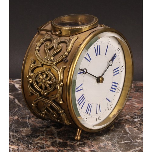 2463 - An early 20th century French brass circular carriage type timepiece, 9cm enamel clock dial inscribed... 