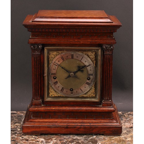 2483 - An early 20th century oak architectural bracket-form mantel clock, 15cm square brass dial with silve... 