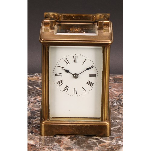 2454 - An early 20th century brass carriage clock, 5.5cm rectangular enamel dial inscribed with Roman numer... 