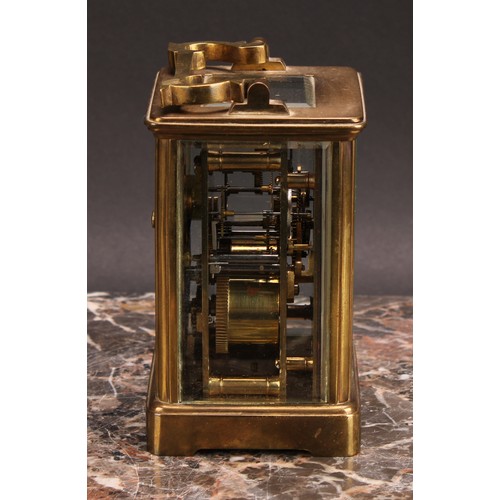 2454 - An early 20th century brass carriage clock, 5.5cm rectangular enamel dial inscribed with Roman numer... 