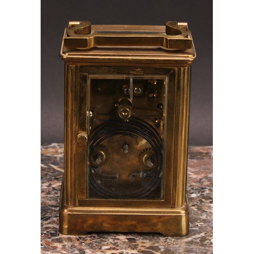 2454 - An early 20th century brass carriage clock, 5.5cm rectangular enamel dial inscribed with Roman numer... 