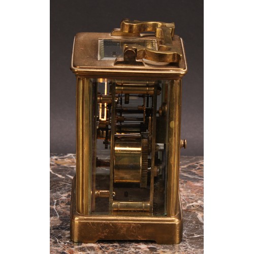 2454 - An early 20th century brass carriage clock, 5.5cm rectangular enamel dial inscribed with Roman numer... 