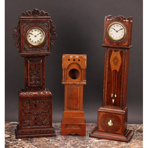 2475 - An early 20th century mahogany and marquetry miniature longcase clock, inlaid in the Secessionist ta... 