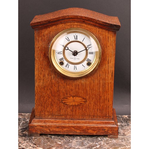 2489 - An early 20th century oak mantel clock, 10cm circular dial inscribed MANUFACTURED BY SEIKOSHA, TOKYO... 