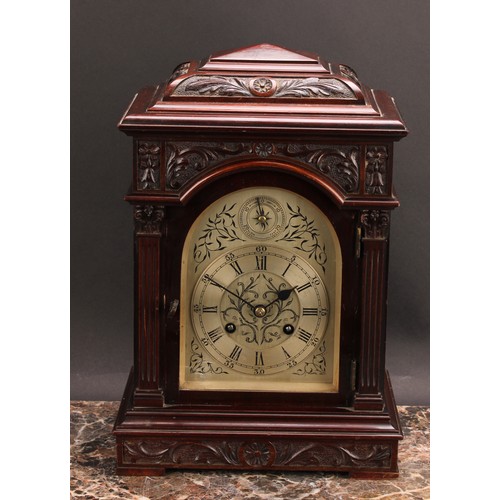 2477 - An early 20th century mahogany bracket-form mantel clock, 14cm arched silvered dial, Roman and subsi... 