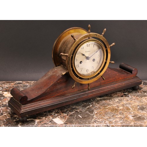 2453 - An early 20th century brass and mahogany ship’s wheel mantel clock, 10.5cm silvered dial inscribed W... 