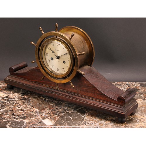 2453 - An early 20th century brass and mahogany ship’s wheel mantel clock, 10.5cm silvered dial inscribed W... 