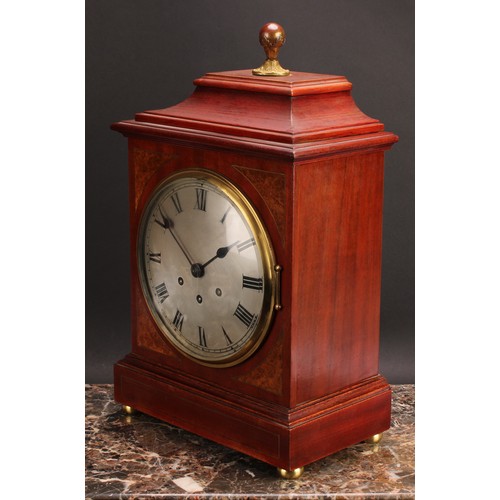 2479 - An early 20th century mahogany bracket-form mantel clock, 20cm circular silvered dial inscribed with... 