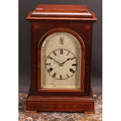 2480 - An early 20th century mahogany mantel clock, 15cm arched silvered dial inscribed with Roman numerals... 