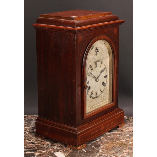 2480 - An early 20th century mahogany mantel clock, 15cm arched silvered dial inscribed with Roman numerals... 