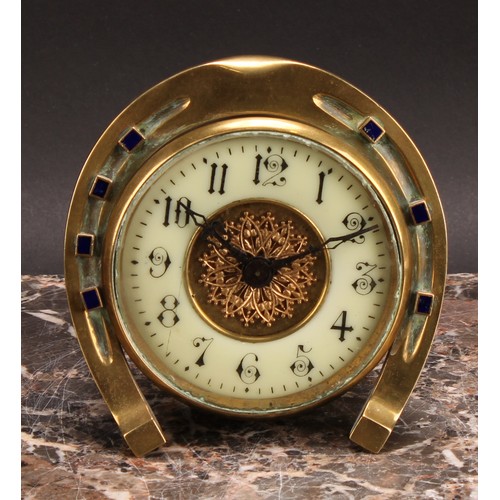 2456 - An early 20th century brass desk timepiece, of equestrian interest, 8cm circular clock dial inscribe... 