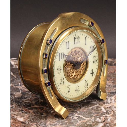 2456 - An early 20th century brass desk timepiece, of equestrian interest, 8cm circular clock dial inscribe... 