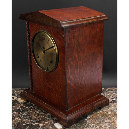 2492 - An early 20th century oak officer’s mess type mantel clock, 14.5cm circular brass dial inscribed C.W... 