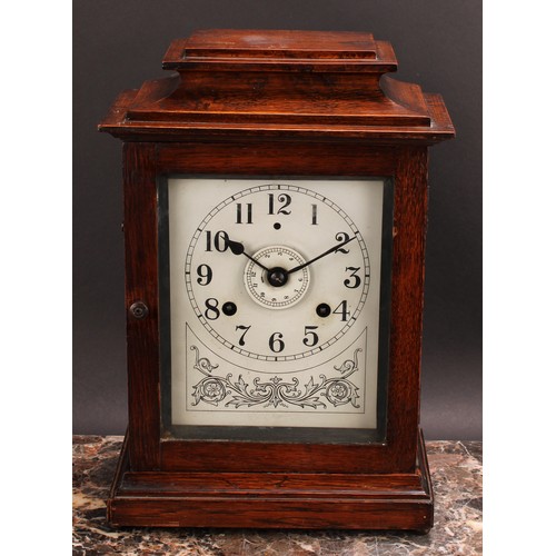 2485 - An early 20th century oak bracket or mantel alarm clock, John Bull Automatic Alarm, Patent No. 23106... 