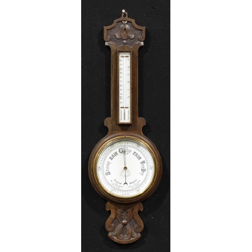 2498 - An early 20th century oak wheel barometer, 19cm circular register inscribed LANCASTER & THORPE LTD T... 