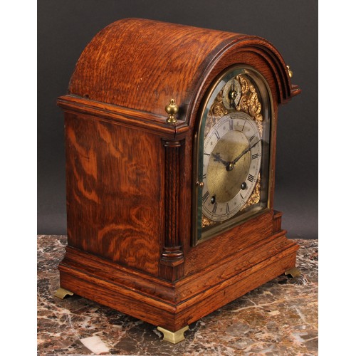 2486 - An early 20th century oak bracket-form mantel clock, 14cm arched brass dial with silvered chapter ri... 