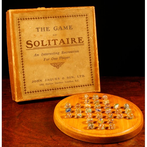 7091 - Parlour Games - a John Jaques & Son Ltd. circular solitaire board, comprising thirty three glass mar... 